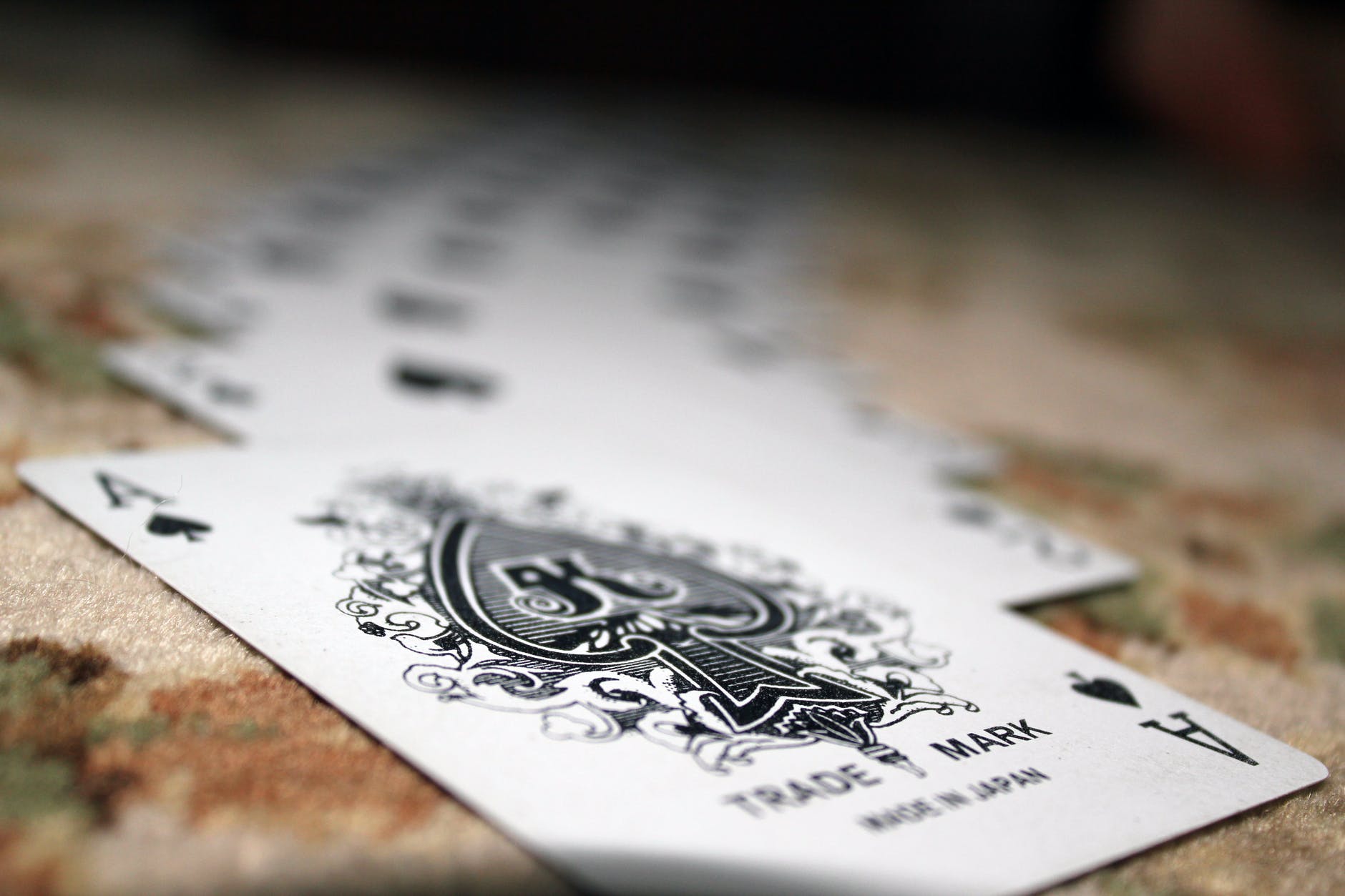 selective focus photography of ace of spade playing card